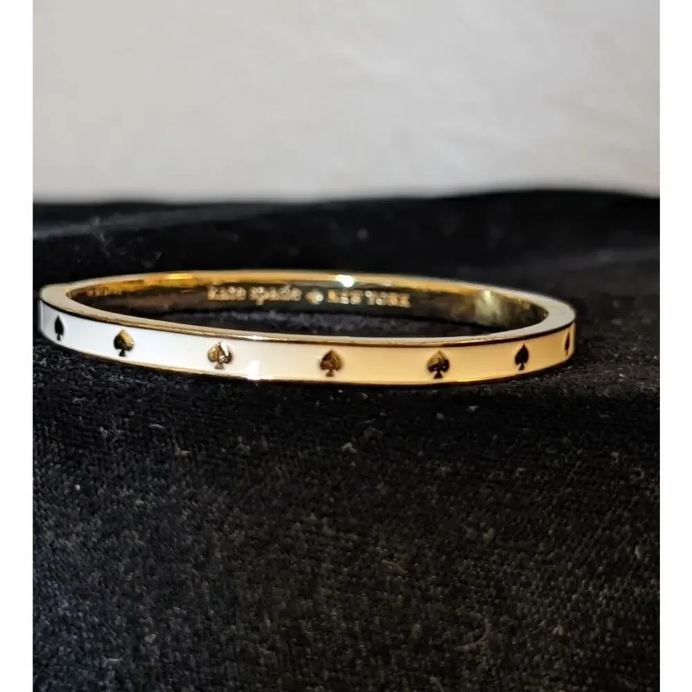 Kate Spade New York White Enamel Gold Tone Hinge Bangle Bracelet - Picture 2 of 5